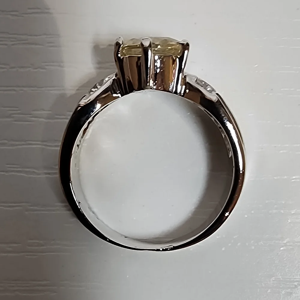 Silver Tone Ring With Large Light Yellow Gemstone